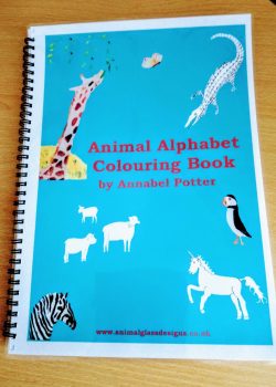 Cover of sprial bound animal alphabet colouring book. A children's book also suitable for adults.